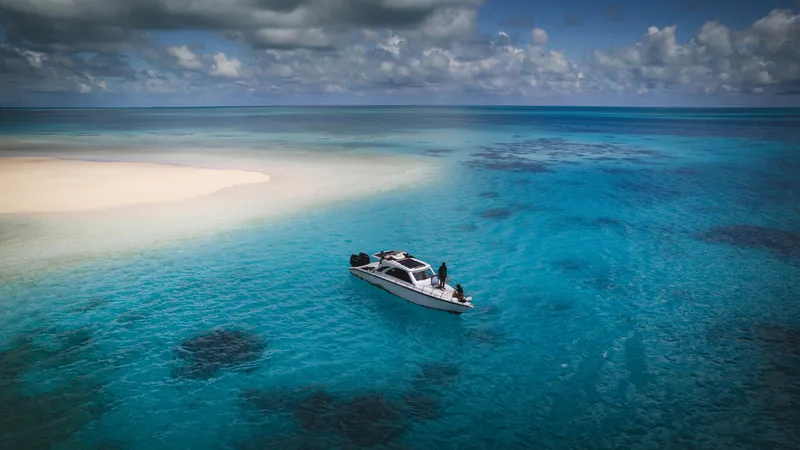 Boat Anchored at Sandbank in Ayau