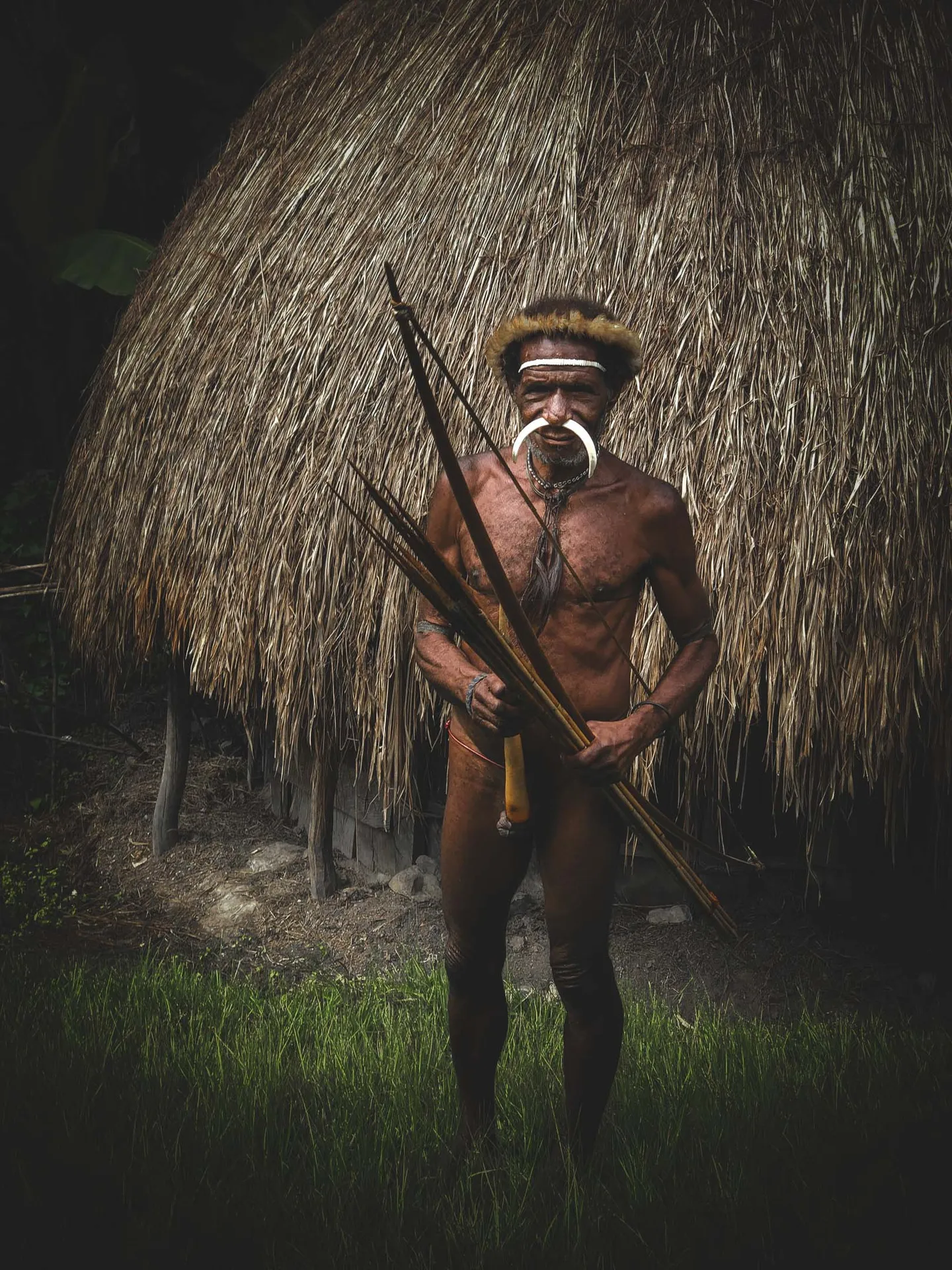 Man with traditional dress in Baliem Valley