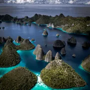 The deep blue lagoon at the heart of Wayag, Raja Ampat