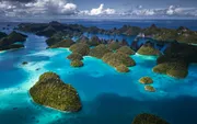 The iconic panorama over Wayag's karst islands and turquoise lagoons