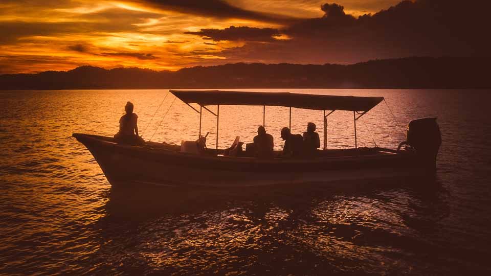 Boat on the water during sunset
